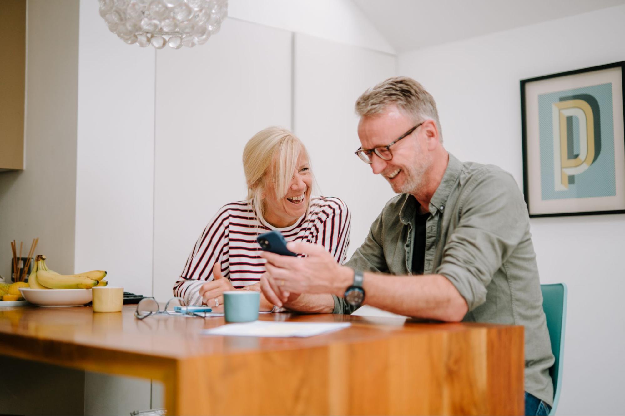 Couple looking at phone